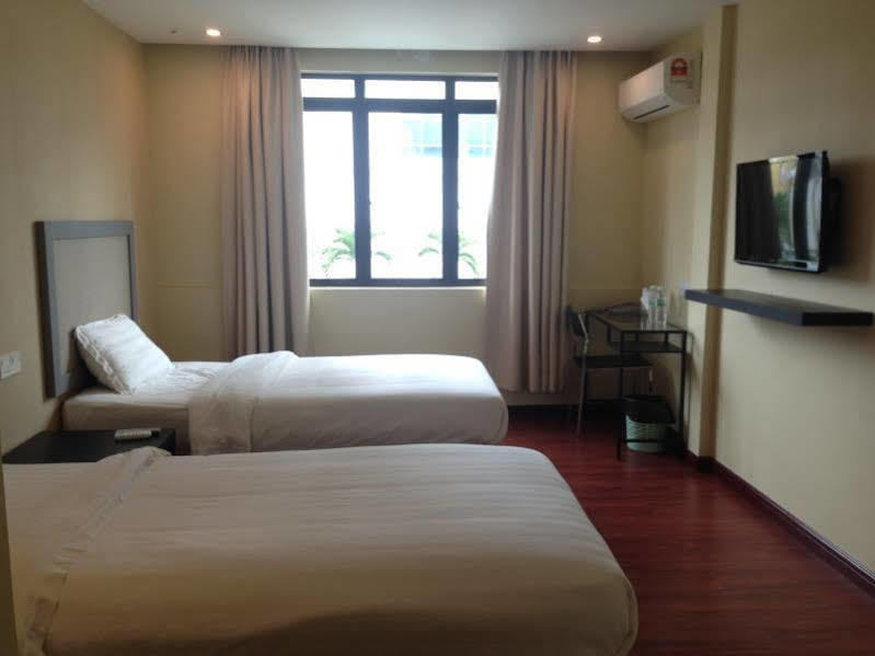 Mcity Inn Miri Bagian luar foto